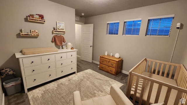 1395 E Kelsey Dr, Eagle Mountain, UT 84005 - bedroom with baseboards, carpet flooring, and a nursery area