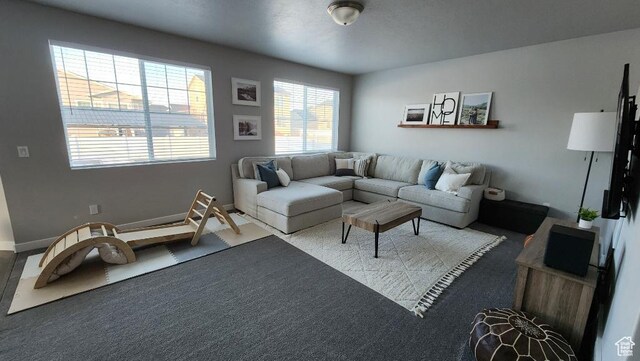 1395 E Kelsey Dr, Eagle Mountain, UT 84005 - carpeted living room with baseboards
