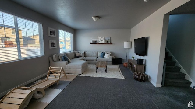 1395 E Kelsey Dr, Eagle Mountain, UT 84005 - carpeted living area with stairs and baseboards