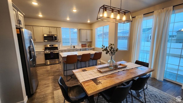 1395 E Kelsey Dr, Eagle Mountain, UT 84005 - dining room featuring dark wood-style flooring and recessed lighting