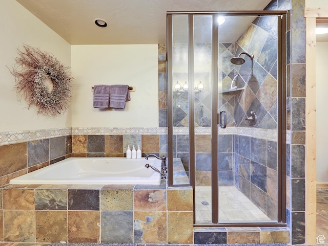 161 N Irish Trl, Brian Head, UT 84719 - bathroom featuring a shower stall and a garden tub