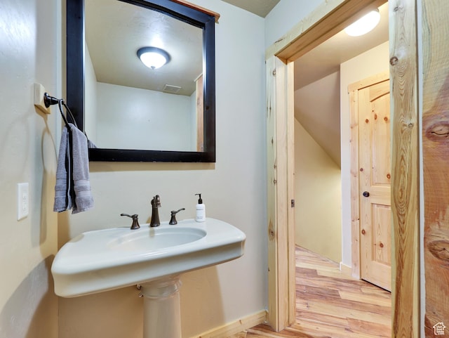 161 N Irish Trl, Brian Head, UT 84719 - bathroom featuring wood finished floors, visible vents, and baseboards