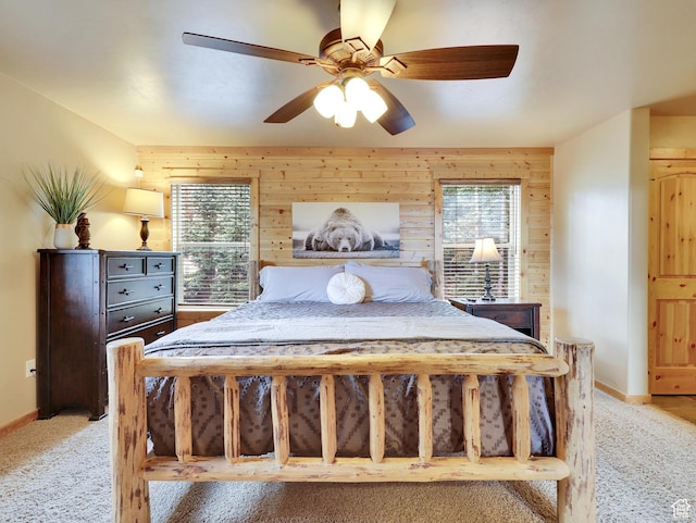 161 N Irish Trl, Brian Head, UT 84719 - bedroom featuring wooden walls, light colored carpet, baseboards, and ceiling fan