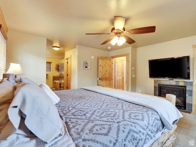 161 N Irish Trl, Brian Head, UT 84719 - bedroom with carpet floors, a ceiling fan, and a tile fireplace