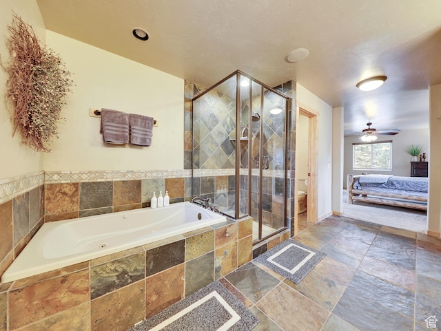 161 N Irish Trl, Brian Head, UT 84719 - full bathroom with toilet, a garden tub, a stall shower, stone tile flooring, and ensuite bath