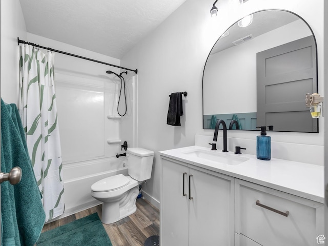 6119 N White Rock Rd, Eagle Mountain, UT 84005 - bathroom with visible vents, shower / tub combo with curtain, toilet, wood finished floors, and vanity