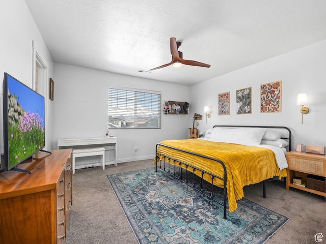 6119 N White Rock Rd, Eagle Mountain, UT 84005 - bedroom with visible vents, a textured ceiling, carpet floors, baseboards, and ceiling fan
