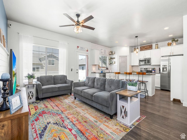 6119 N White Rock Rd, Eagle Mountain, UT 84005 - living room with ceiling fan, dark wood-type flooring, and recessed lighting