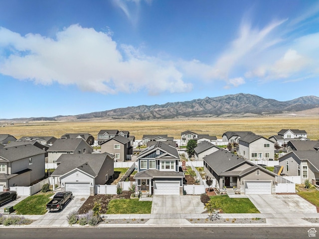 6119 N White Rock Rd, Eagle Mountain, UT 84005 - aerial view of residential area with a mountain backdrop