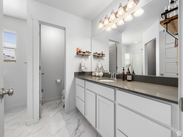 6119 N White Rock Rd, Eagle Mountain, UT 84005 - bathroom featuring baseboards, toilet, a stall shower, marble finish floor, and vanity