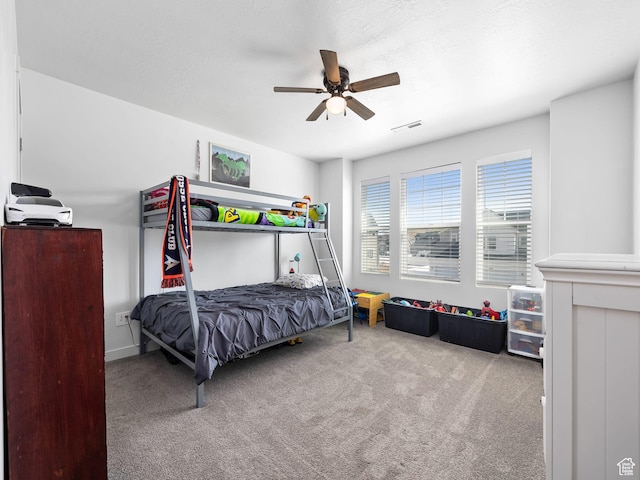 6119 N White Rock Rd, Eagle Mountain, UT 84005 - carpeted bedroom featuring visible vents and a ceiling fan