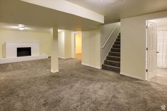 454 E 3100 N, North Ogden, UT 84414 - finished basement featuring baseboards, carpet, stairway, a fireplace, and a textured ceiling