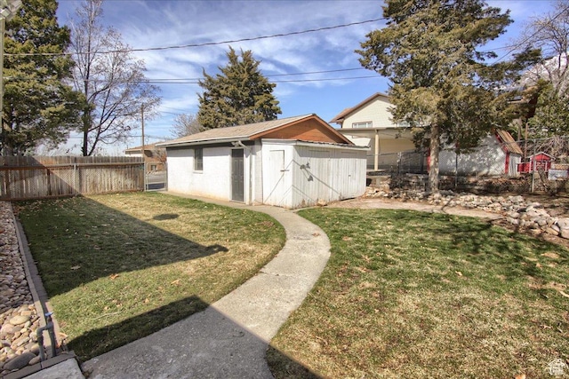 454 E 3100 N, North Ogden, UT 84414 - view of yard featuring a shed, an outdoor structure, and a fenced backyard