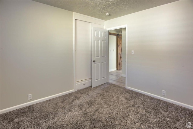 454 E 3100 N, North Ogden, UT 84414 - carpeted spare room featuring baseboards and a textured ceiling