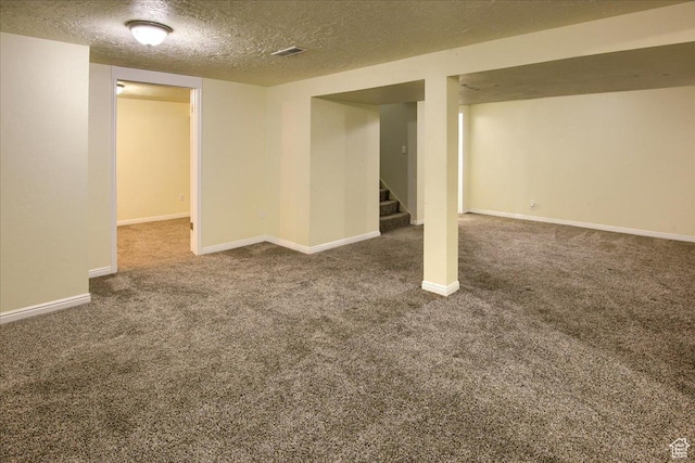 454 E 3100 N, North Ogden, UT 84414 - finished basement featuring stairway, baseboards, carpet, and a textured ceiling