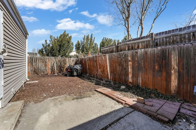 4201 S 2260 W, Taylorsville, UT 84129 - view of yard featuring a patio area and a fenced backyard