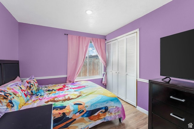 4201 S 2260 W, Taylorsville, UT 84129 - bedroom with a closet and light wood-style flooring