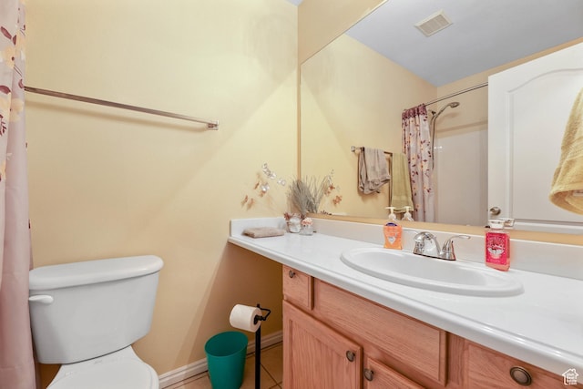 full bathroom with visible vents, baseboards, toilet, tile patterned floors, and vanity