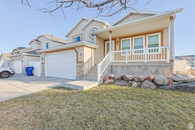 view of front of property with driveway, a porch, stucco siding, stone siding, and a garage