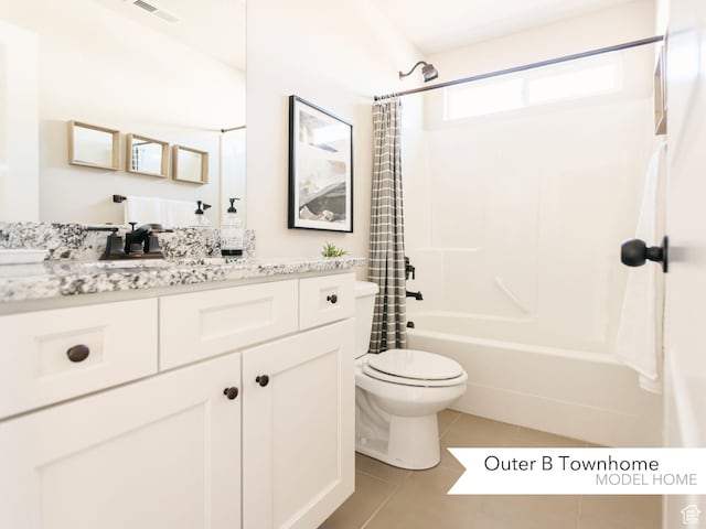 full bath with shower / bath combo, vanity, toilet, visible vents, and tile patterned flooring