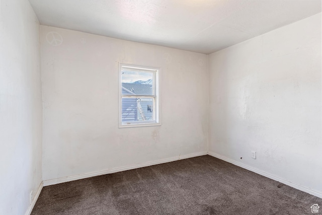 171 17th St, Ogden, UT 84404 - empty room with dark carpet and baseboards