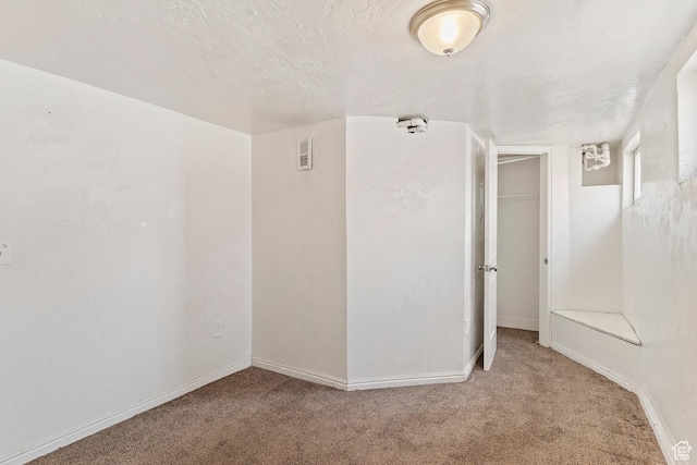 171 17th St, Ogden, UT 84404 - carpeted empty room with baseboards