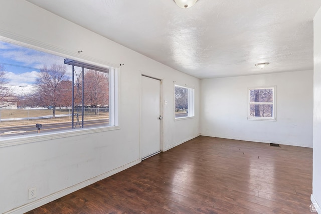 171 17th St, Ogden, UT 84404 - foyer entrance featuring wood finished floors and baseboards