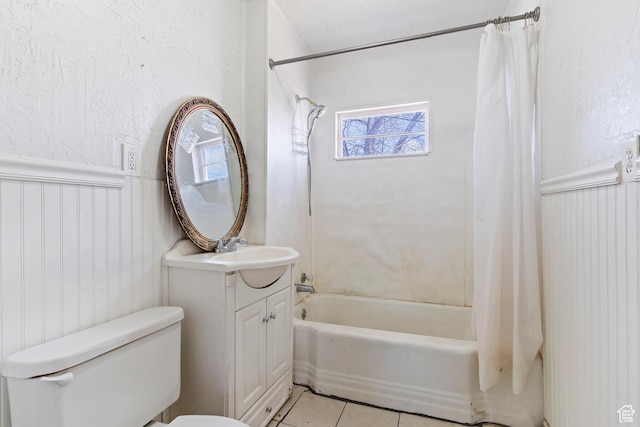 171 17th St, Ogden, UT 84404 - full bath with shower / bath combination with curtain, tile patterned flooring, vanity, toilet, and a wainscoted wall