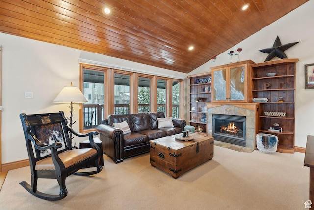 carpeted living room with baseboards, lofted ceiling, recessed lighting, a tile fireplace, and wood ceiling