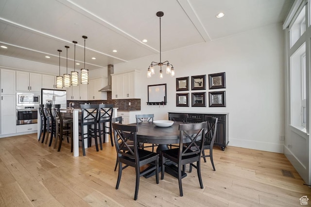 292 N Abajo Peak Way, Heber City, UT 84032 - dining space with beamed ceiling, light wood finished floors, a chandelier, recessed lighting, and baseboards
