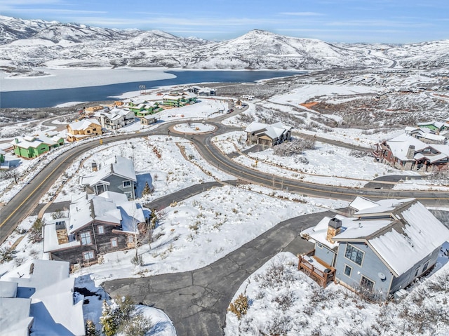 10740 N Hideout Trl, Hideout, UT 84036 - snowy aerial view featuring a residential view and a mountain view
