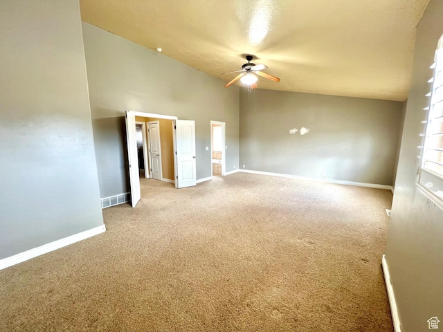 15 E 1100 S, Vernal, UT 84078 - unfurnished bedroom with a ceiling fan, vaulted ceiling, carpet, and baseboards