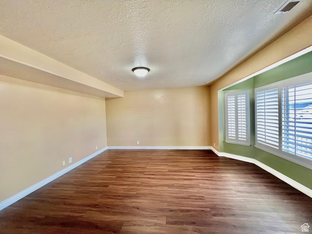 15 E 1100 S, Vernal, UT 84078 - empty room with baseboards, a textured ceiling, and wood finished floors