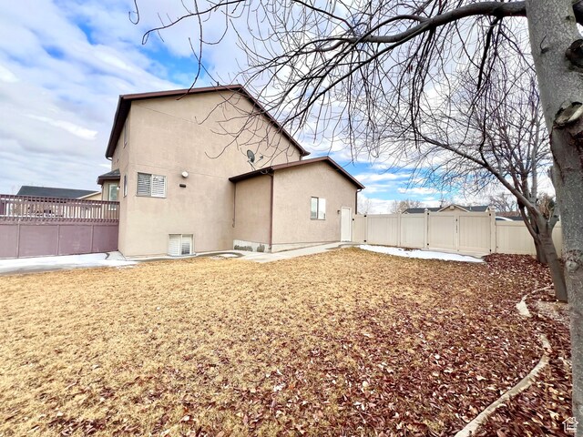 15 E 1100 S, Vernal, UT 84078 - back of property featuring stucco siding and fence