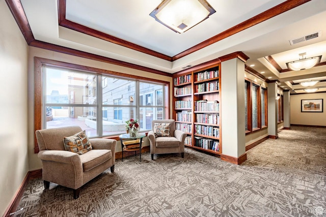 5 S 500 W Unit 908, Salt Lake City, UT 84101 - living area featuring built in features, visible vents, baseboards, a tray ceiling, and crown molding