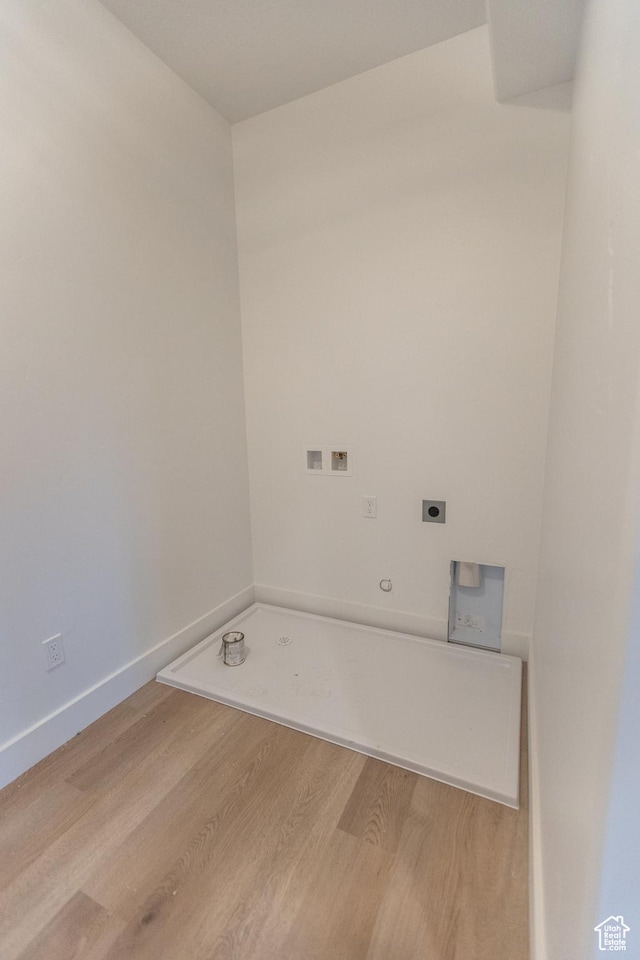1183 S 1335 E Unit 76, Garland, UT 84312 - washroom with electric dryer hookup, washer hookup, light wood-style flooring, baseboards, and laundry area