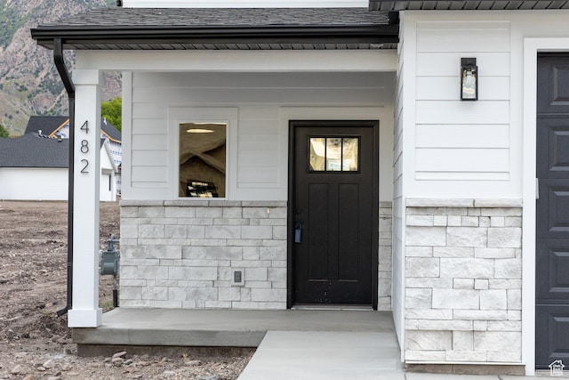 1183 S 1335 E Unit 76, Garland, UT 84312 - property entrance featuring a shingled roof