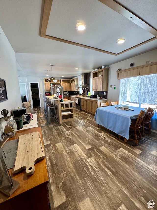 924 E Breeze Way Unit 106, Garden City, UT 84028 - dining space featuring dark wood-style floors and recessed lighting