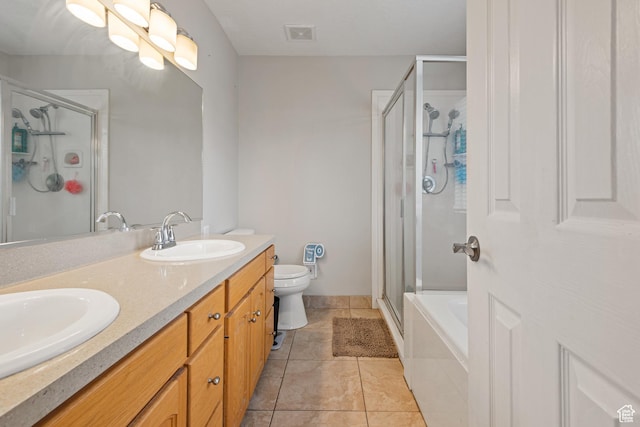 2144 N 750 W, Clinton, UT 84015 - bathroom featuring a shower stall, double vanity, toilet, and tile patterned flooring