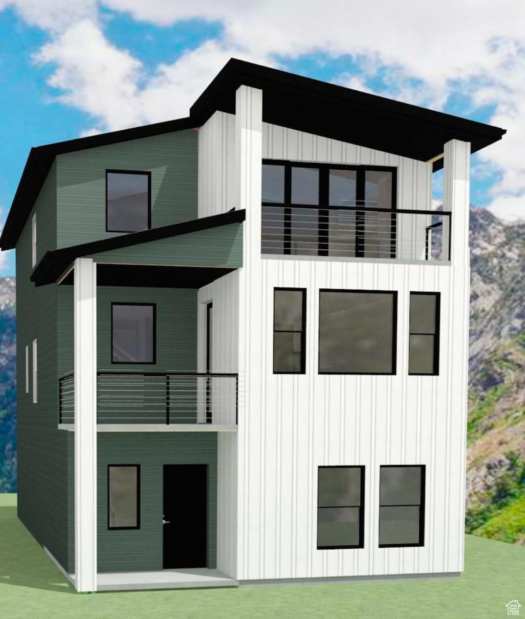 6960 Elk Wallow Dr Unit 6, Park City, UT 84098 - back of property featuring a balcony, a lawn, and board and batten siding