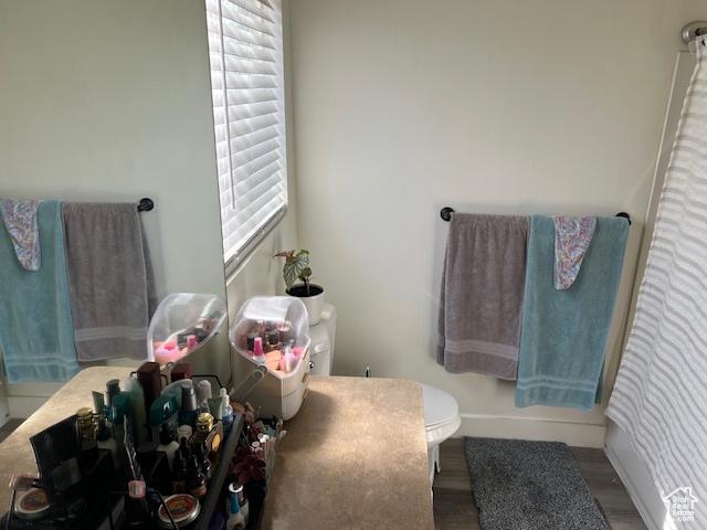 2048 W Brynn Ave S Unit 7, West Haven, UT 84401 - bathroom featuring toilet and wood finished floors