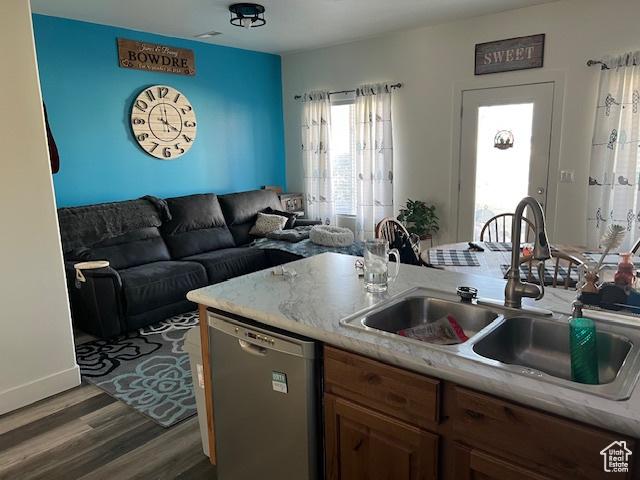 2048 W Brynn Ave S Unit 7, West Haven, UT 84401 - kitchen featuring a sink, open floor plan, light countertops, dishwasher, and dark wood-style flooring