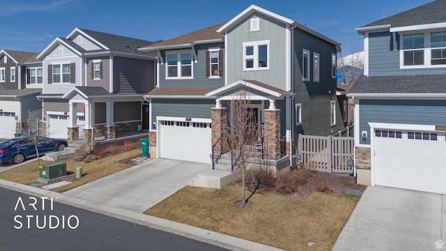 4672 W Tulip N, Cedar Hills, UT 84062 - craftsman house featuring concrete driveway, a garage, stone siding, board and batten siding, and a residential view