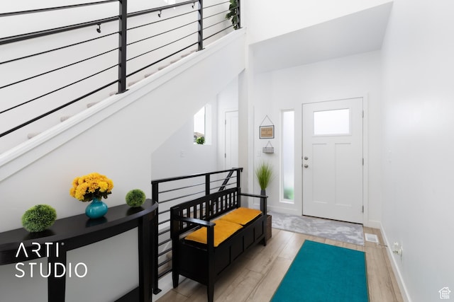4672 W Tulip N, Cedar Hills, UT 84062 - foyer with wood finished floors and baseboards