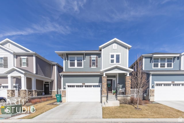 craftsman inspired home with stone siding, a garage, covered porch, and driveway
