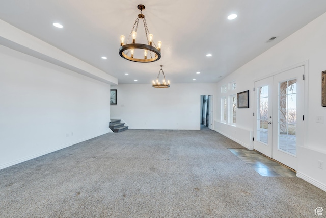 2382 S Spanish Oaks Dr, Spanish Fork, UT 84660 - unfurnished living room with stairs, recessed lighting, an inviting chandelier, and carpet