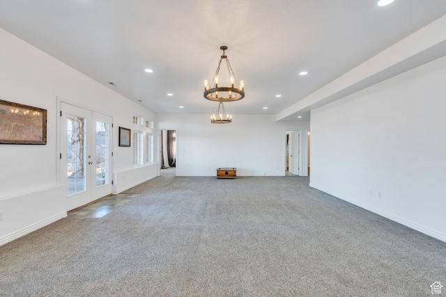 2382 S Spanish Oaks Dr, Spanish Fork, UT 84660 - unfurnished living room with a chandelier, french doors, carpet, recessed lighting, and baseboards