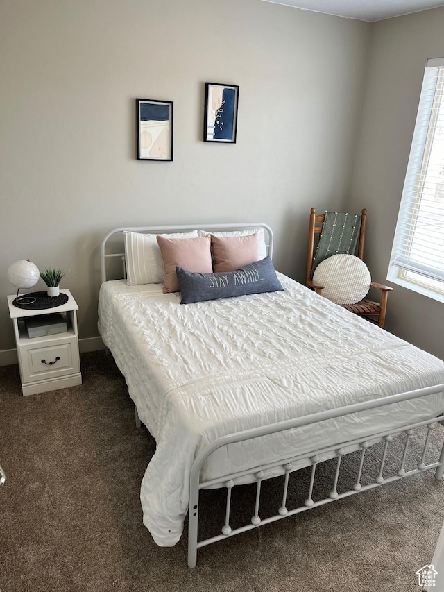 1036 S Fir St, Cedar City, UT 84720 - carpeted bedroom featuring baseboards