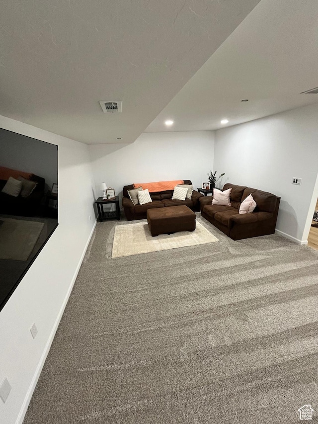 1036 S Fir St, Cedar City, UT 84720 - unfurnished living room featuring visible vents, recessed lighting, baseboards, and carpet