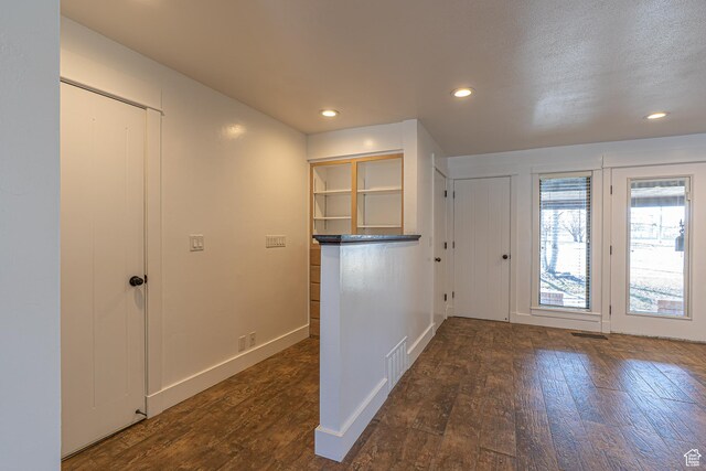 717 E Park Dr N, Hyrum, UT 84319 - entryway with dark wood finished floors, visible vents, recessed lighting, and baseboards